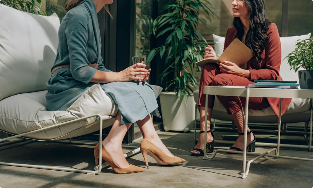 Two women engaged in a conversation