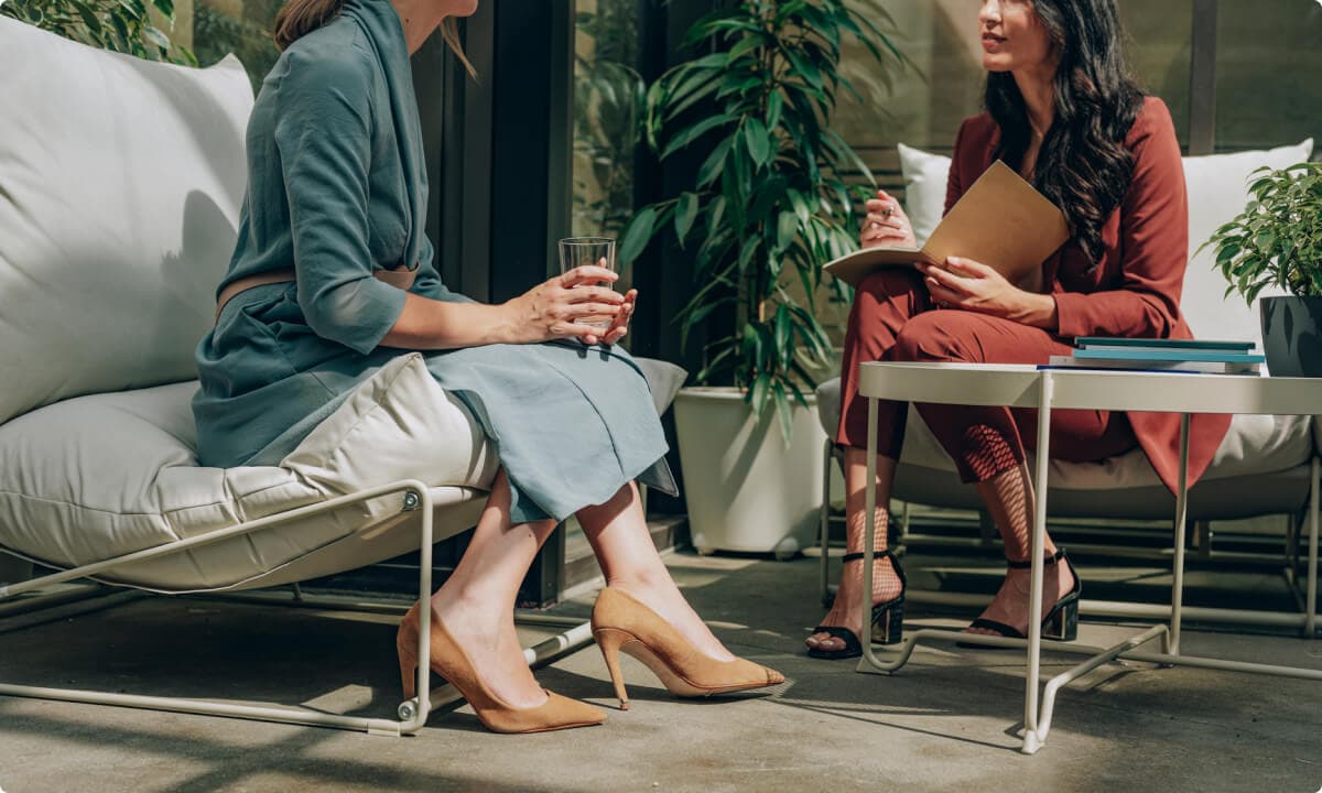 Two women engaged in a conversation