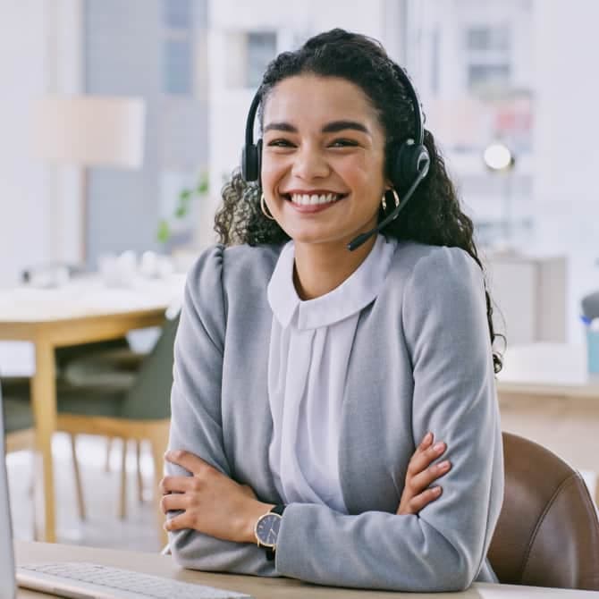 Female answering agent smiling